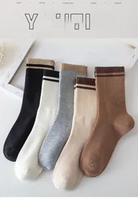 Detailed set of five cotton crew socks in earth tones with sporty striped cuffs