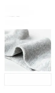 Close-up of grey combed cotton socks featuring breathable ribbed texture and high elasticity