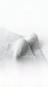 Detail of high-elastic combed cotton sock heel showing breathable knit fabric texture