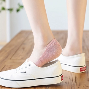 Pink low cut invisible boat socks with cute cartoon rabbit embroidery on wooden background