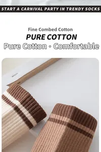 Close-up of ribbed cuffs on striped combed cotton socks in warm earth tones