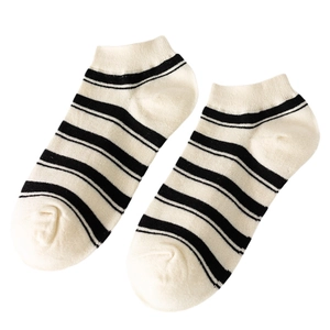 Minimalist black striped ankle socks for women with breathable knit texture and ribbed cuffs