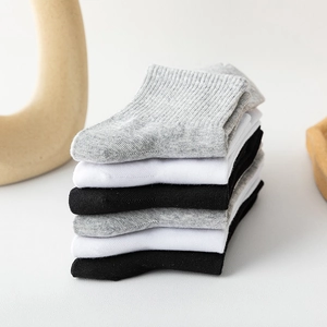 Set of six combed cotton crew socks in white grey and black with ribbed cuffs