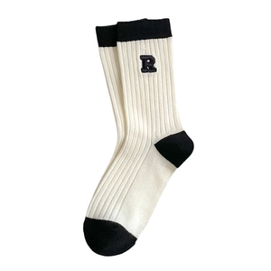 Chic black and white striped cotton socks with R letter embroidery and ribbed texture
