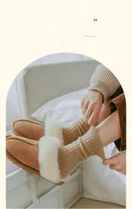 Close-up of cozy brown suede slippers with white faux fur lining and warm ribbed socks