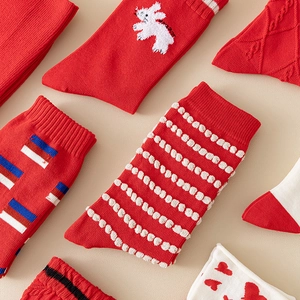 Red and cream cotton crew socks with rabbit and stripe patterns for women in preppy style
