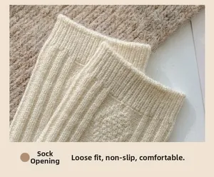 Detail of high-elasticity ribbed cuff on cream faux wool socks for non-slip comfort
