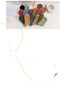 Macro view of assorted ribbed cotton mid-calf socks in various vibrant colors