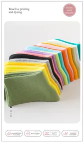 Detailed fan-shaped stack of multi-color ribbed knit cotton socks in vibrant tones