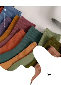 Detail of combed cotton ribbed socks in various retro solid colors and soft texture