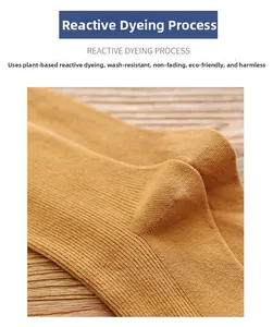 Detail of ginger yellow ribbed knit socks with eco-friendly active plant dyeing texture