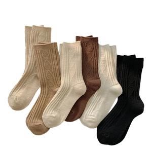 Five-pack of cable-knit thermal socks for women in beige and brown neutral tones