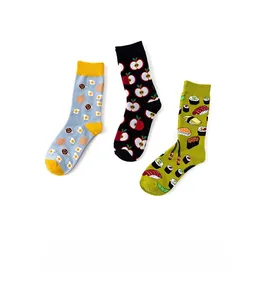 Detailed view of three pairs of cotton crew socks featuring sushi, apple, and egg patterns