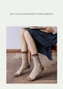 Detail of wool socks with bear pattern, lettuce edge trim and comfortable elastic cuff