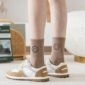 Women's brown cotton socks with embroidered smiley face, high crew length in retro style