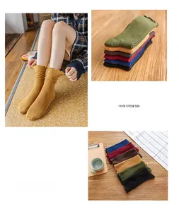 Detailed knit texture and frilled cuff design on colorful cotton crew socks