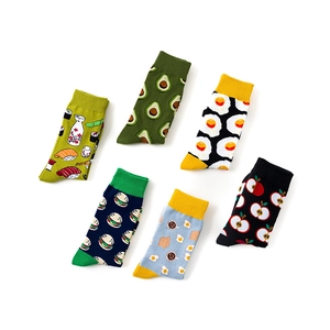 Set of 6 colorful cotton crew socks featuring fun avocado, egg, and fruit food patterns