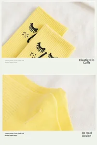 Detail of bright yellow cotton socks showing elastic cuff and 3D heel knitting craft