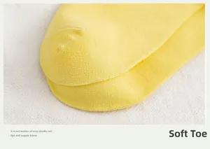 Close-up of soft yellow cotton sock toe featuring high-density knit and comfort seams