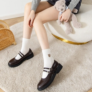 White crew socks with cute bear embroidery and dark brown leather Mary Jane shoes