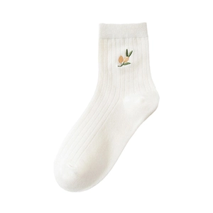 White crew socks featuring olive branch embroidery and ribbed cuffs for a minimalist look