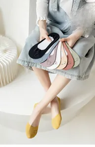 Close-up of low cut ice silk socks featuring colorful candy tones and cute cartoon embroidery
