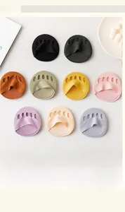 Flat lay of colorful five-hole open toe forefoot pads showing knit texture and colors