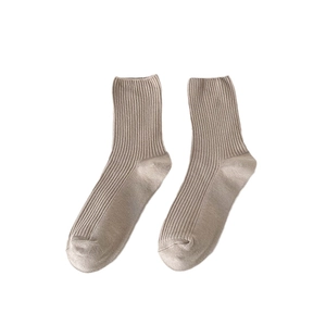 Beige ribbed knit mid-calf crew socks with elastic cuffs on a clean white background