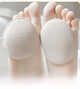 Macro view of beige knit forefoot pads with ergonomic seamless design for high heel relief