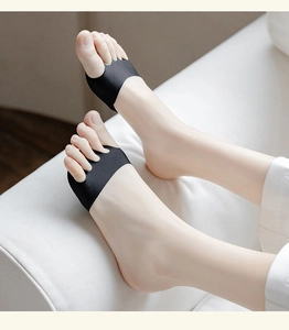 Detailed close-up of black high-elastic five-toe forefoot pads for high heels