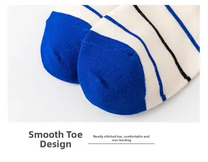 Detailed macro view of seamless blue and white striped cotton sock toe construction