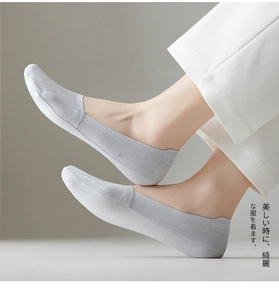 Close-up of thin grey ice silk invisible liner socks with non-slip seamless edge