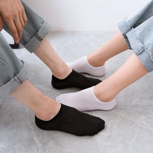 Chaussettes invisibles unisexes en coton noir et blanc avec silicone antidérapant