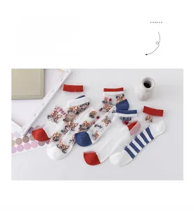 Flat lay of five pairs of breathable mesh socks with cat patterns and striped designs