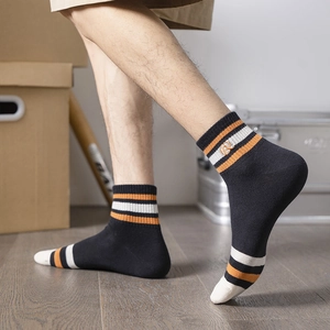 Men's cotton crew socks with athletic stripes and R letter embroidery in black and orange