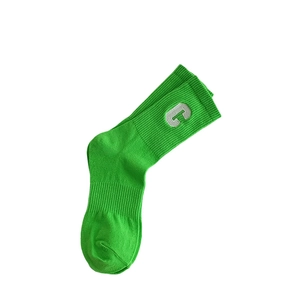 Cotton crew socks in bright green featuring embroidered C letter for athletic style