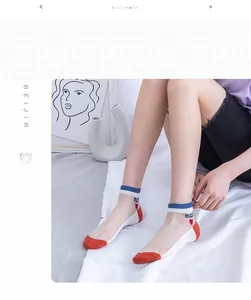 Detail of ultra-thin mesh women's socks with orange toe and blue striped cuff accents