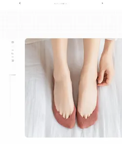 Top-down view of a brick red low-cut invisible sock in fine knit for summer shoes