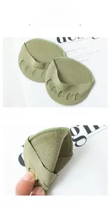 Close-up of elastic light green five-toe forefoot pads for high heels with high elasticity