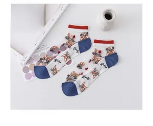 Detail of sheer summer ankle socks with cute cat print and breathable mesh fabric