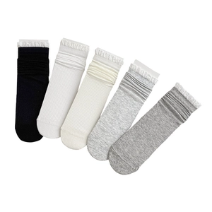 Five pairs of ballet style cotton crew socks with white lace trim in various neutral tones