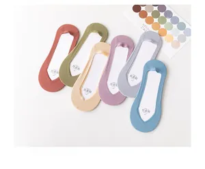 Set of six seamless ice silk no-show socks in various pastel colors on a soft textile background