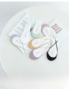 Detail of ultra-thin invisible socks with elastic cross straps and breathable mesh design