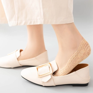 Elegant floral lace no-show socks with non-slip silicone and beige flat loafers