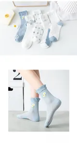 Detailed view of summer cotton socks set featuring daisy embroidery and breathable mesh