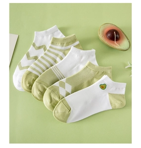 Close-up of five pairs of avocado green and white patterned low cut ankle socks for women