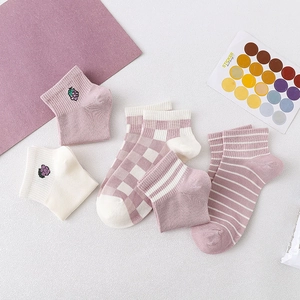 Set of four women's cotton ankle socks featuring purple grape embroidery and stripe patterns