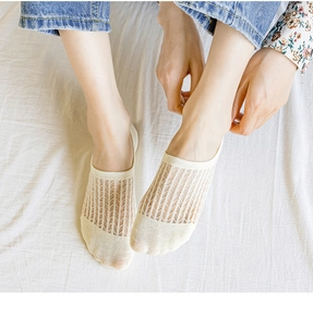 Close-up of beige mesh invisible boat socks showing breathable diamond knit pattern