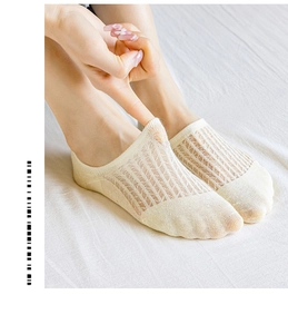 Close-up of beige breathable mesh invisible low-cut socks showing cotton texture