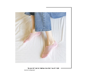 Detail of pink lace mesh invisible socks with breathable cotton texture for low-cut shoes